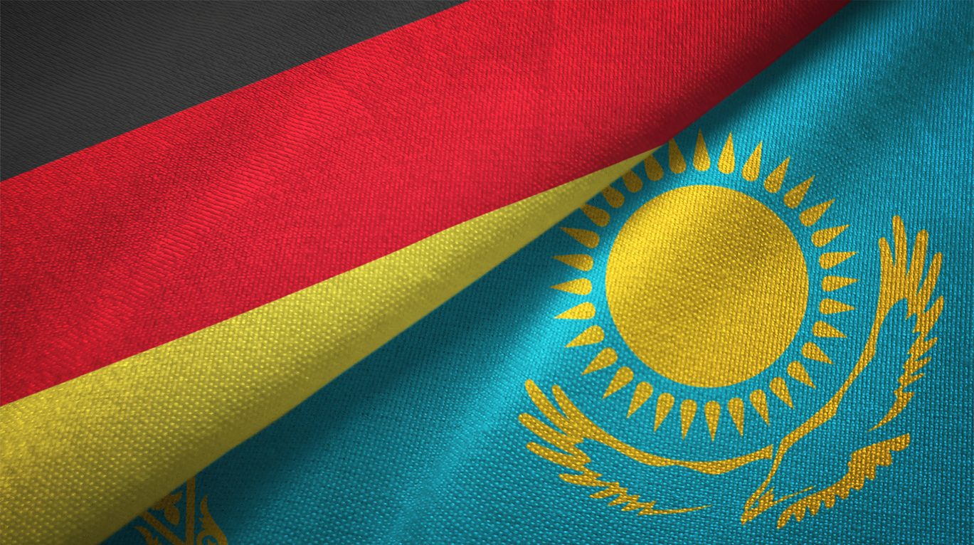 Flaggen von Kasachstan und Deutschland übereinander Die Flaggen von Deutschland und Kasachstan übereinandergelegt.